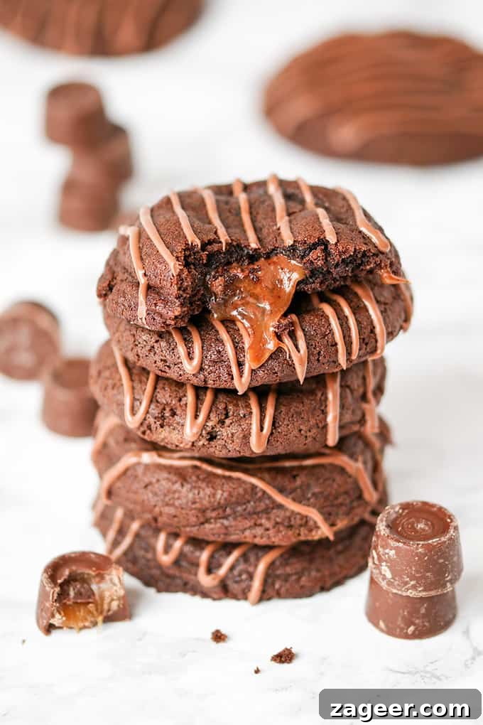 Gooey Rolo-Stuffed Chocolate Chip Cookies 3 Gooey Rolo Stuffed Cookies. Chewy Chocolate cookies with a gooey Rolo centre!