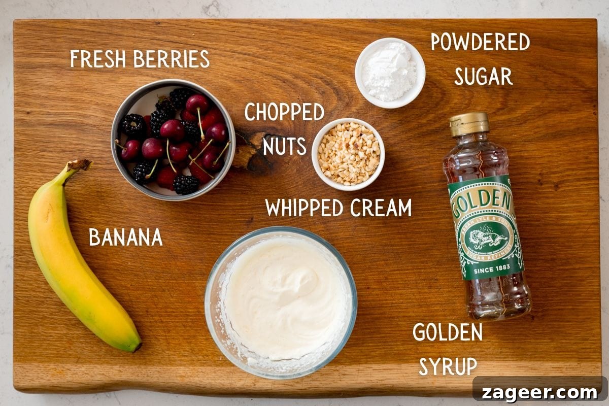 Cinnamon French Toast Recipe: Crispy, Custardy Morning Toast 4 A wooden board displaying ingredients for French Toast toppings: a banana, a bowl of fresh berries, chopped nuts, whipped cream, icing sugar, and golden syrup, all labelled.