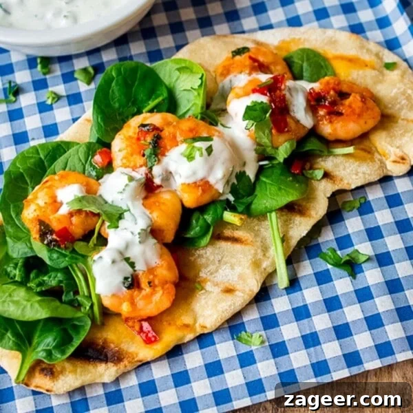 Chicken Tikka Pizza Recipe: Crispy Homemade Tandoori-Style Pizza 12 Garlic chilli prawns with spinach and yogurt dip on homemade flatbread.