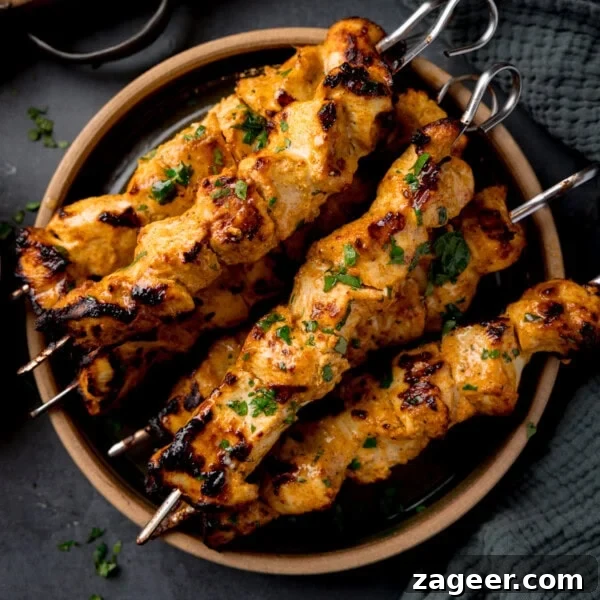 Crispy Chilli Beef in the Air Fryer: Quick Spicy Recipe 14 Air Fryer chicken tikka kebabs with cilantro.