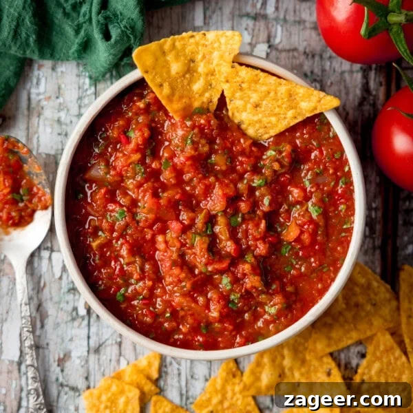 Quick Chicken Fajitas with Peppers and Onions 10 Bowl of thick tomato salsa with coriander and tortilla chips.