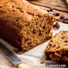 15 Cozy Autumn Baking Ideas for Weekend Treats 13 Close up of a sliced fruit tea loaf.