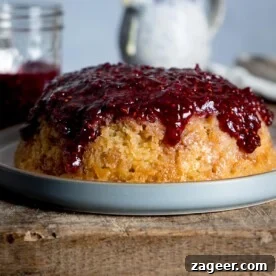 15 Cozy Autumn Baking Ideas for Weekend Treats 16 Slow cooker steamed jam sponge on a plate.