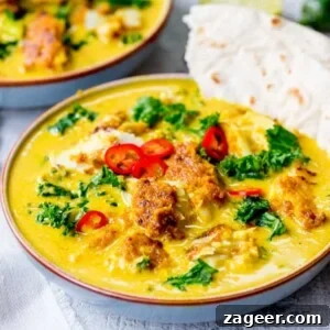 Homemade Thai Yellow Curry with Fish Recipe 3 Square image of Thai fish yellow curry with kale.