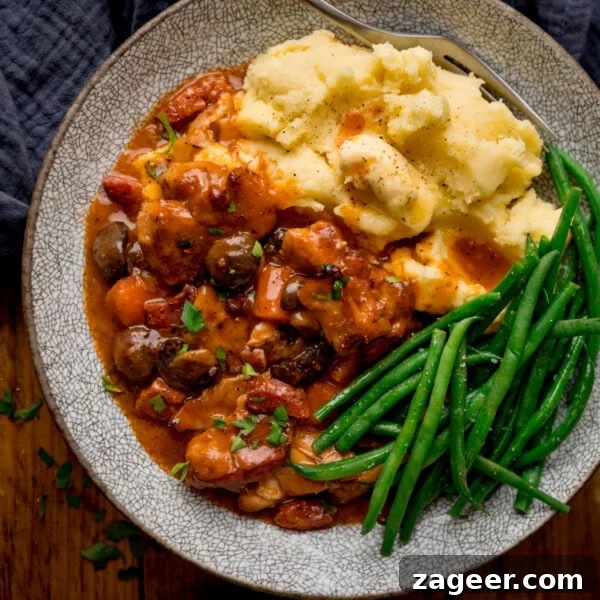 Steak Fries with Creamy Peppercorn Sauce 16 A square, overhead shot of Chicken Chasseur served with mashed potatoes and green beans.