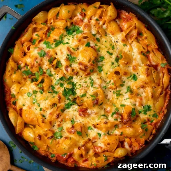 Crispy Potato and Bacon Hash Recipe for Breakfast or Brunch 11 Creamy tuna tomato pasta bake topped with melted cheese and chopped parsley.