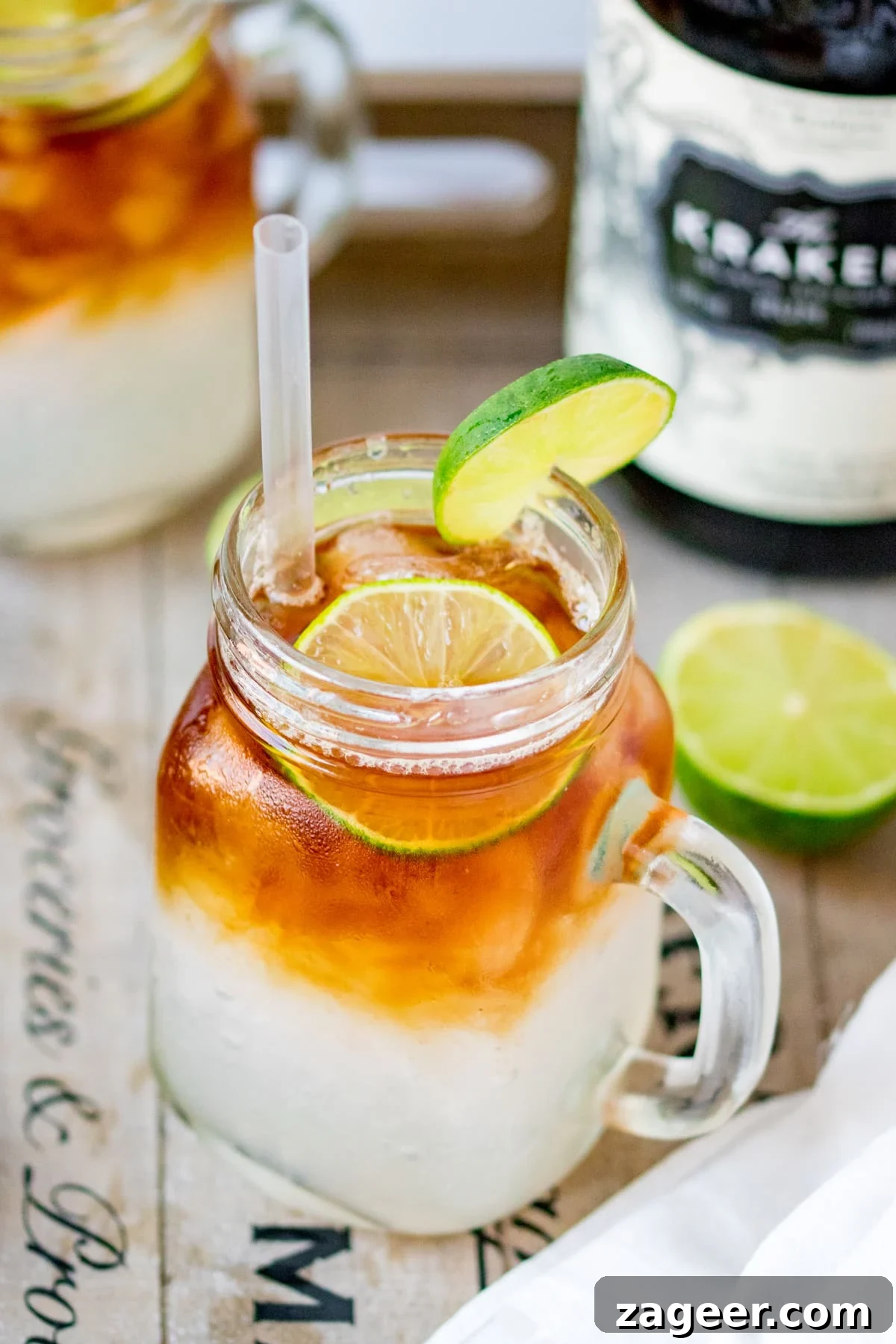Dark ’N’ Stormy Cocktail Recipe: Classic Rum & Ginger Mix 2 Dark and stormy cocktail in a mason jar glass with a slice of lime