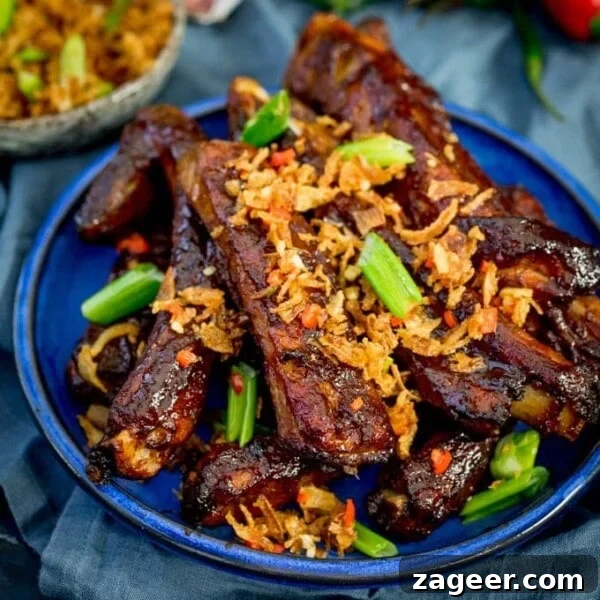 Sticky Slow-Cooked BBQ Ribs You Can Make at Home 9 Oven baked Asian ribs with crispy onions