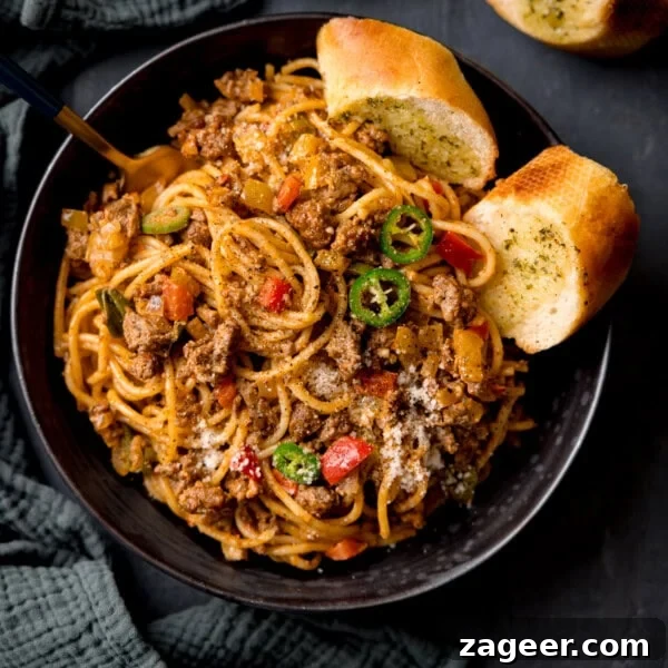 Spicy Gochujang Cream Pasta Recipe You’ll Love 16 Buffalo Minced Beef Spaghetti in a black bowl.