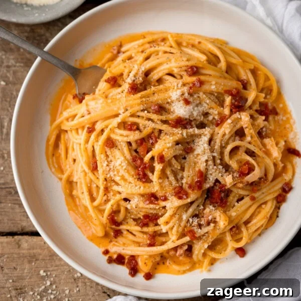 Spicy Gochujang Cream Pasta Recipe You’ll Love 17 Chorizo spaghetti on a white plate.