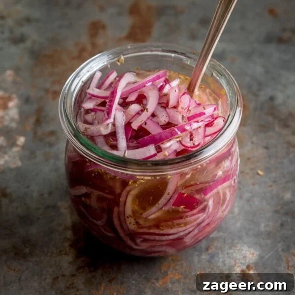 Crisp Asian Cucumber Salad with Sesame Ginger Dressing 9 Marinated sliced red onions in a glass jar