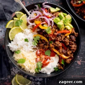 11 Fresh Spring Dinners Ready in 30 Minutes or Less 10 A minced beef fajita bowl with white rice, grated cheese, seasoned minced beef with peppers, sliced red onions, avocado, lime wedges, soured cream, salsa, and coriander.