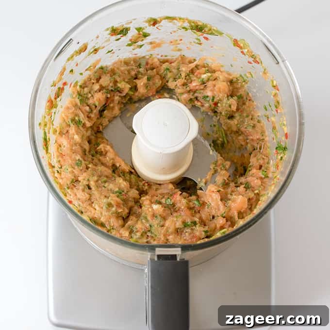 Thai-style fish burgers with sweet chilli sauce - really simple to make and they taste amazing!