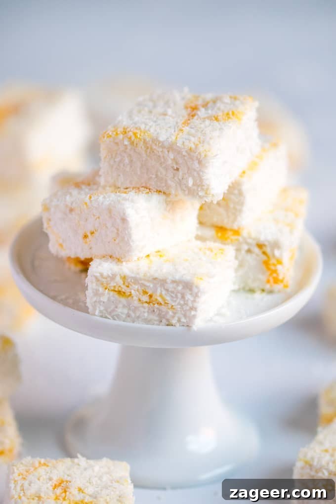 Lemon Curd Coconut Marshmallows — Tart, Tropical Confections 5 Lemon Curd and Coconut Marshmallows - light and fluffy, these marshmallows make an amazing homemade gift!