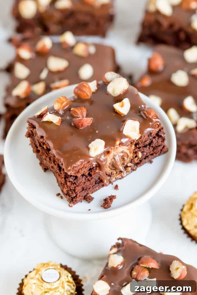 Ferrero Rocher Brownies with Silky Milk Chocolate Ganache 2 These Ferrero Rocher Brownies are the ultimate treat to go with your afternoon cup of coffee!