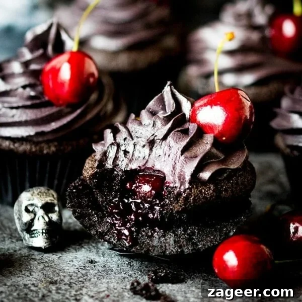 Spider Web Chocolate Cupcakes for Halloween Parties 12 These halloween black cupcakes with cherry filling make a scrumptiously spooktacular dessert!