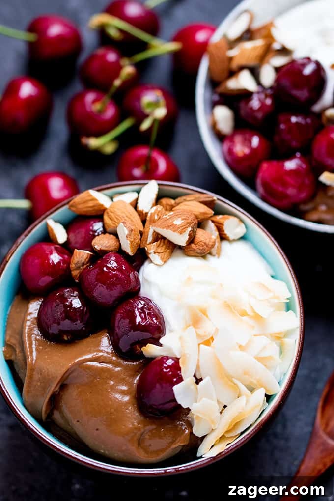 Avocado chocolate mousse bowl with roasted cherries - sweet, indulgent but healthier too!