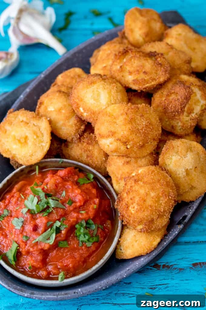 Crispy Fried Ravioli with Spicy Tomato Dipping Sauce 2 Crispy Fried Ravioli With Spicy Tomato Dip - an easy and totally moreish party food!