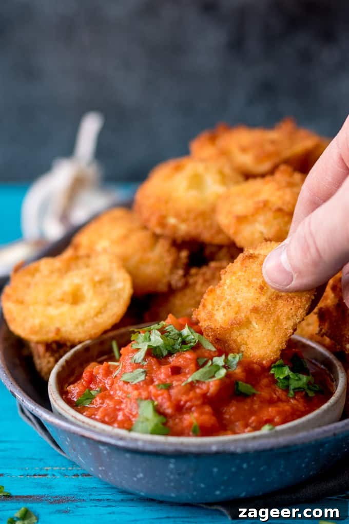 Crispy Fried Ravioli with Spicy Tomato Dipping Sauce 3 Crispy Fried Ravioli With Spicy Tomato Dip - an easy and totally moreish party food!