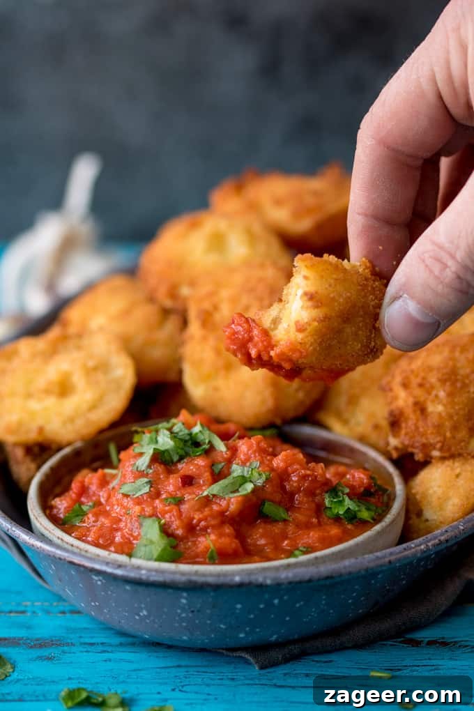 Crispy Fried Ravioli with Spicy Tomato Dipping Sauce 4 Crispy Fried Ravioli With Spicy Tomato Dip - an easy and totally moreish party food!