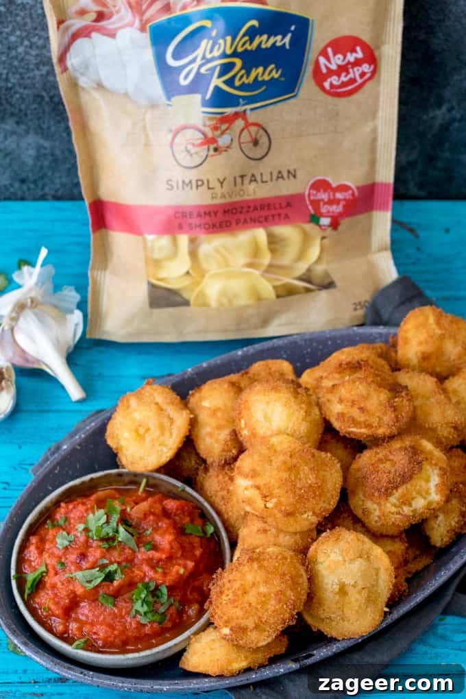 Crispy Fried Ravioli with Spicy Tomato Dipping Sauce 5 Crispy Fried Ravioli With Spicy Tomato Dip - an easy and totally moreish party food!