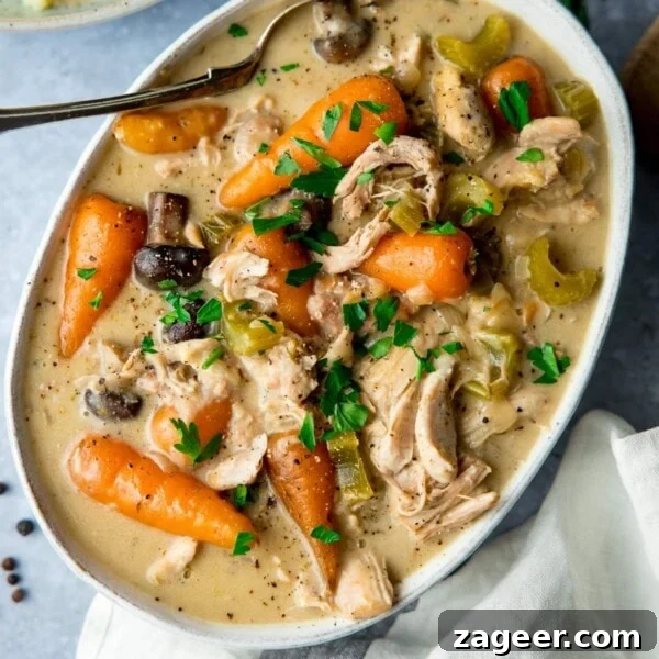 Thai-Style Peanut Pork Recipe: Savory Stir-Fry with Crunchy Peanuts 7 White oblong serving bowl filled with chicken casserole