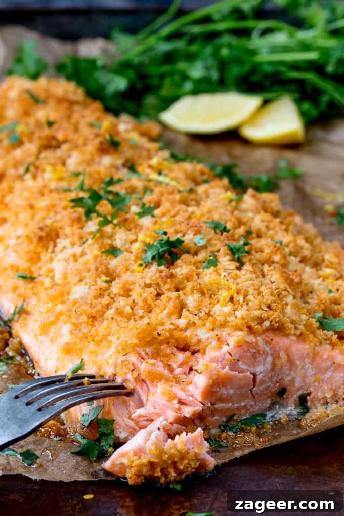 Garlic-Crusted Salmon with Crunchy Bread Topping 2 Garlic Bread Crusted Salmon with lemon and herbs in the background