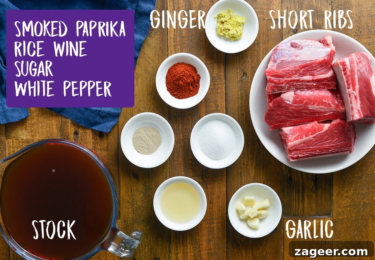 Ingredients for slow cooked Short ribs on a wooden table