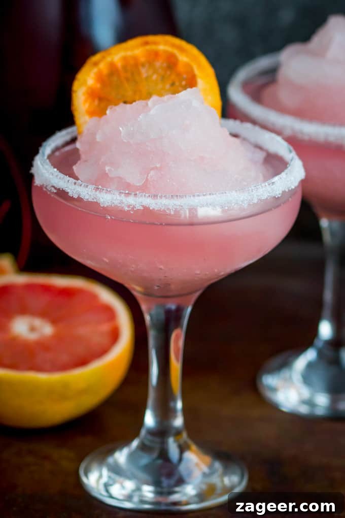 Frozen Pink Grapefruit Prosecco Spritz Recipe 4 Frozen Pink Grapefruit Prosecco Cocktail - A pretty, cooling drink to kick off Spring! It's like a slush puppie for grown ups...
