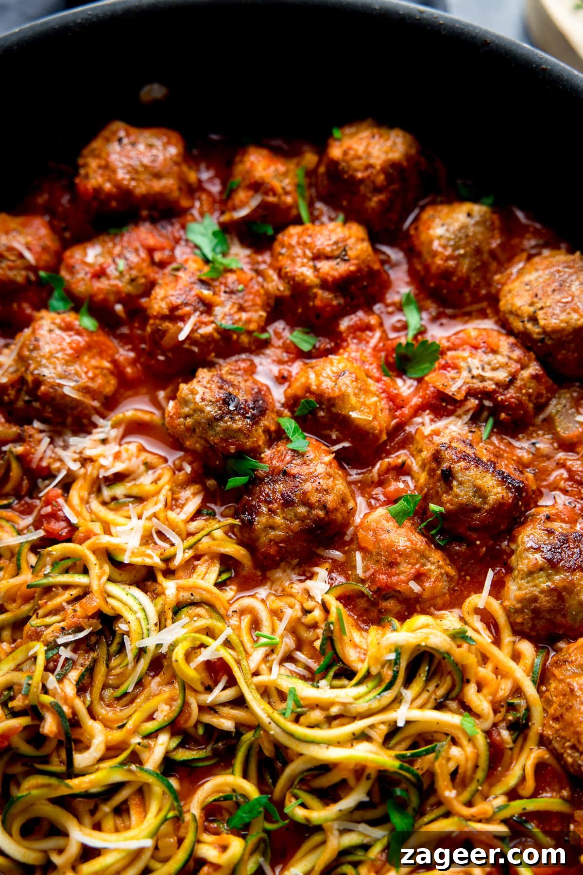 One-Pot Turkey Meatballs with Zucchini Noodles (Courgetti) 2 Close up image of Turkey meatballs and courgetti in a pan