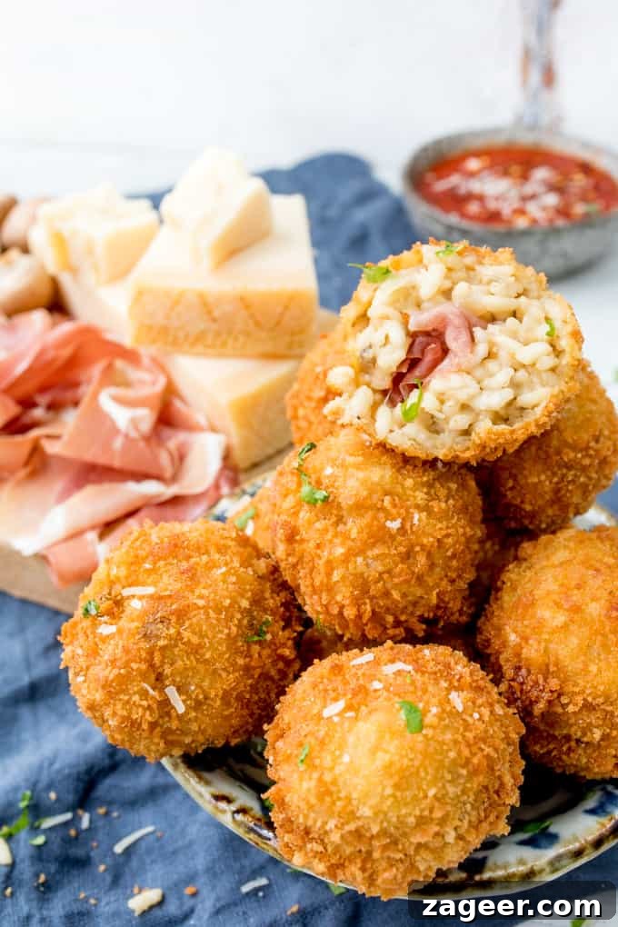 Prosciutto di San Daniele Arancini with Mushroom & Grana Padano 3 Arancini makes such a great appetiser or party food - these ones are made with creamy Grana Padano Cheese and Stuffed with Prosciutto di San Daniele!
