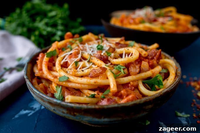 Authentic Amatriciana Pasta Recipe: Classic Roman Sauce Guide 4 Close up side photo of Amatriciana pasta in a bowl