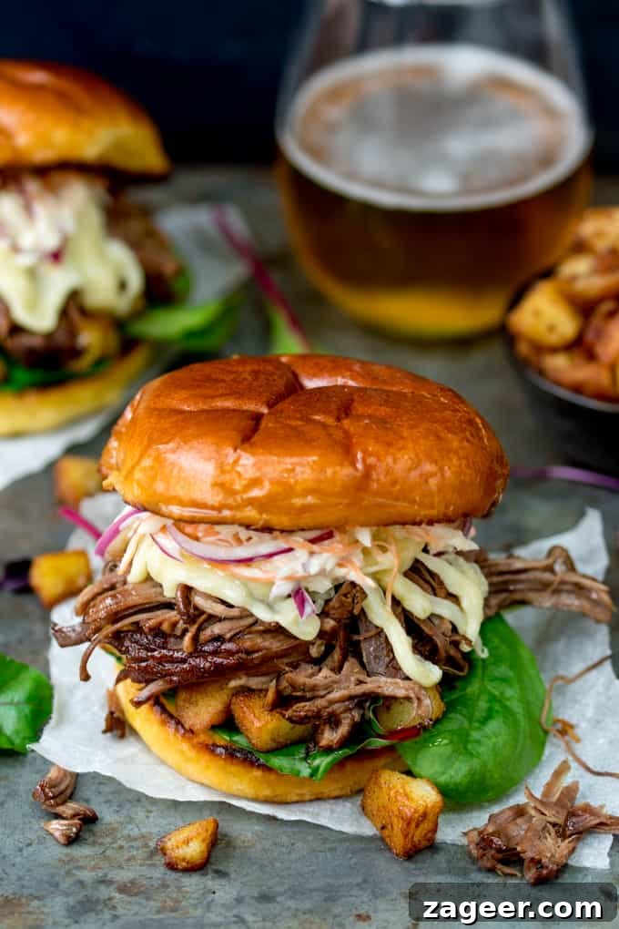 Smoky Brisket Sandwich with Garlic Sautéed Potatoes & Coleslaw 4 This Brisket Sandwich with garlic saute potatoes and homemade coleslaw is proper man-food - perfect for Father's day!