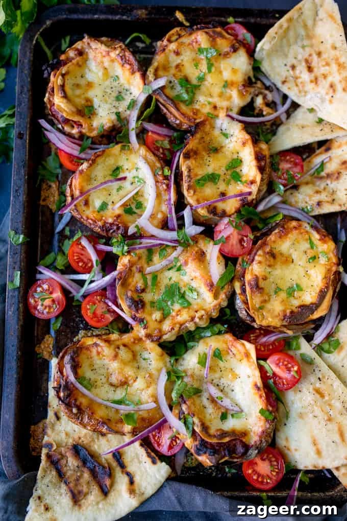 Lasagna-Stuffed Potato Skins with Melty Cheese and Meat 3 Lasagne Potato Skins - serving suggestion