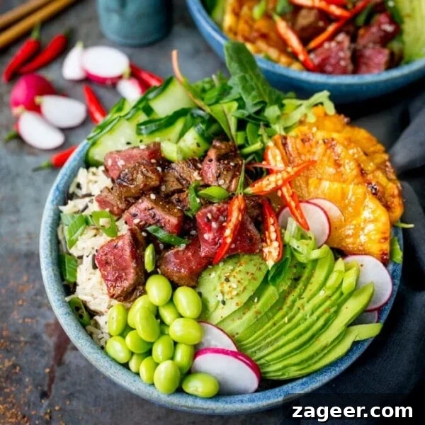 Spicy Chicken Power Bowl with Avocado & Lime Rice 9 Lightening things up without forfeiting any of the flavour in this seared steak poke bowl! A meaty twist on the Hawaiian classic!