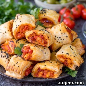 Chicken Chorizo Puff Pastry Rolls: Savory Baked Appetizer Recipe 11 Chicken Chorizo Puff Pastry Rolls - This easy snack uses leftover pasta sauce. Have spaghetti for dinner, and these pastry rolls for lunch the next day!