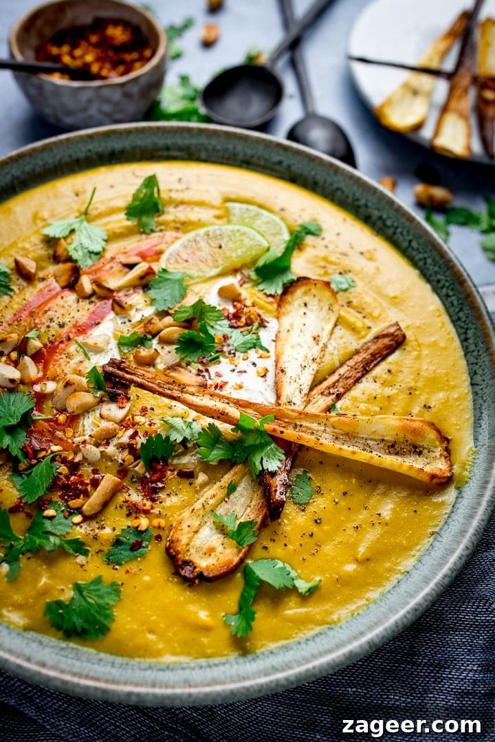 Spicy Parsnip and Sweet Potato Soup Recipe for Cozy Nights 5 Close up image of parsnip and sweet potato soup with parsnip and coriander toppings