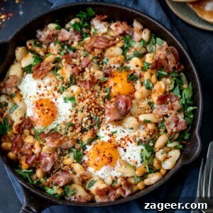 Spicy Scrambled Eggs with Smashed Beans Breakfast Bowl 6 No, it's not shakshuka. Not a tomato in sight! This is my Spicy Egg Breakfast with Smashed Beans and Pancetta! A different way to serve your morning eggs! #onepan #brunch #bruncheggs #smashedbeans