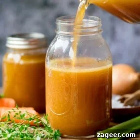 Stock being poured into a jar