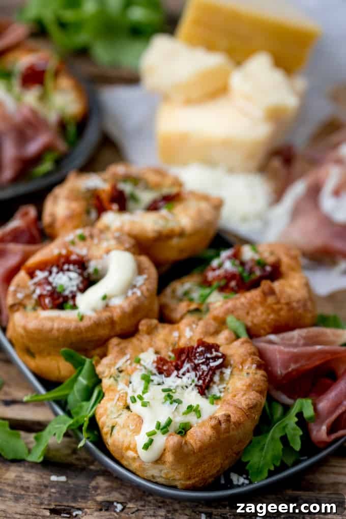 Herb Yorkshire Puddings with Grana Padano Béchamel & Prosciutto di San Daniele 2 No longer a side dish, make Yorkshire Puddings the main event with these herby Yorkshire puddings, filled with cheesy béchamel and sunblush tomatoes!