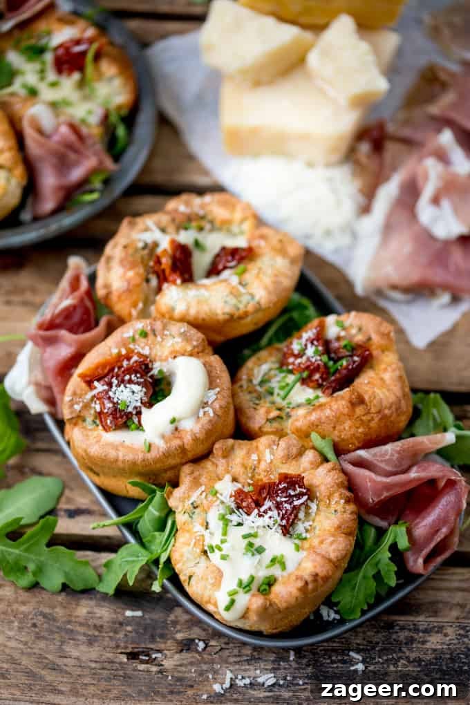 Herb Yorkshire Puddings with Grana Padano Béchamel & Prosciutto di San Daniele 3 No longer a side dish, make Yorkshire Puddings the main event with these herby Yorkshire puddings, filled with cheesy béchamel and sunblush tomatoes!