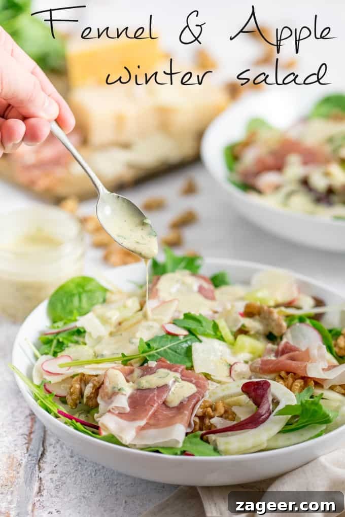 Winter Fennel & Apple Salad with Grana Padano and Prosciutto San Daniele 2 Fennel and Apple Winter Salad with a spiced curry dressing in a white bowl