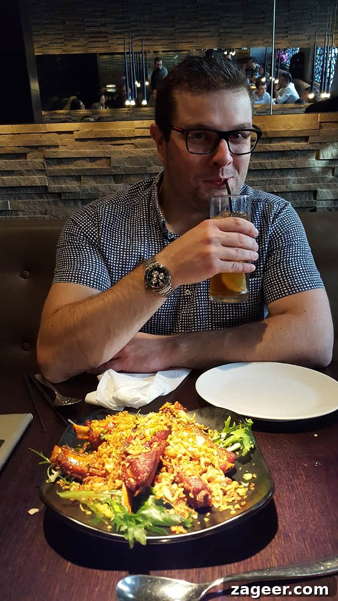 Crispy Onion Oven-Baked Asian Ribs Recipe 3 Chris eating ribs