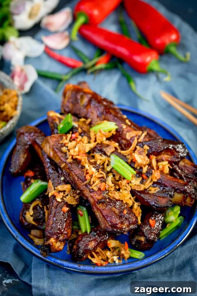 Crispy Onion Oven-Baked Asian Ribs Recipe 5 How about these Oven Baked Asian Ribs with Crispy Onions for Chinese New Year? Slow cooked in the oven until tender, then brushed with a sticky marinade and finished with crispy onions!