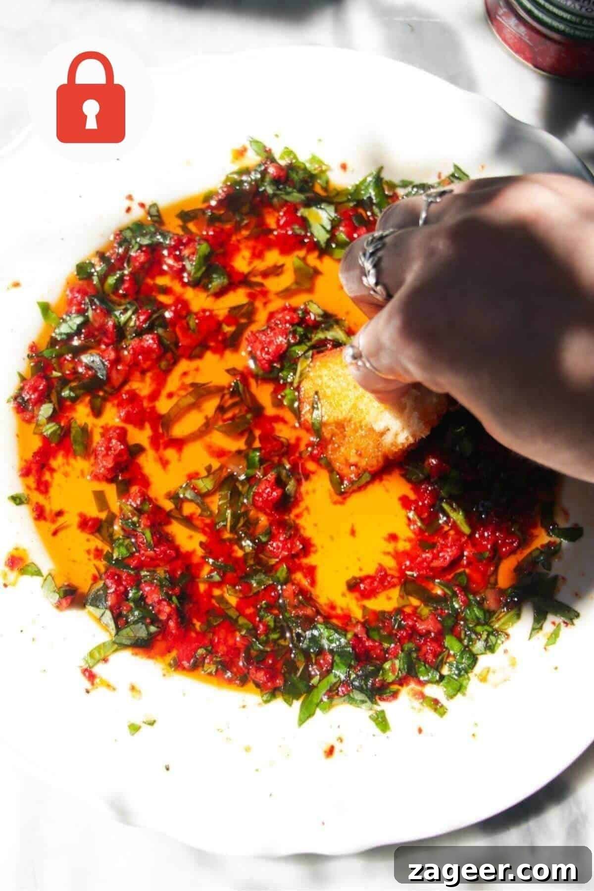 Pizza-Inspired Dipping Oil Recipe for Bread 11 Pizza dipping oil on a serving plate.